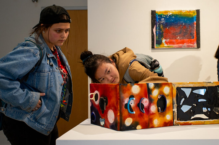 Students view Taha's work in the Goodyear Gallery. Warith Taha interacted with students and faculty throughout his time on campus. Photo by Riley Heffron ’26.