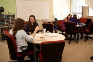 A writer and a tutor work together on an essay in the writing center.