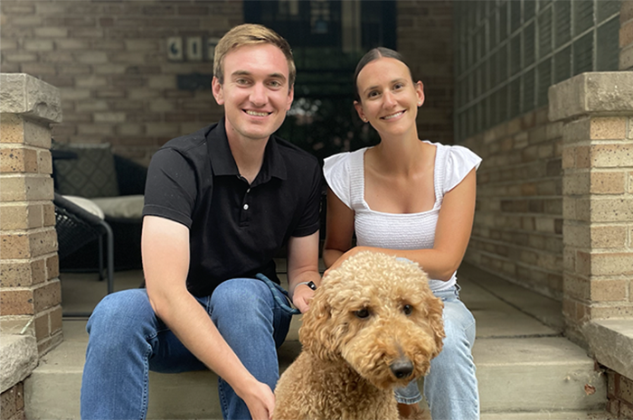 Clayton Hevey ’16 and Faith Wilwerding ’16 with their dog, Clarky.