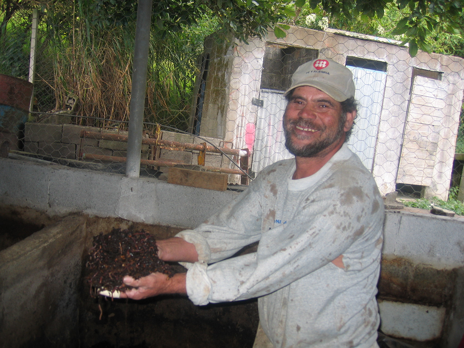 Photograph of a man composting 