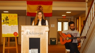 Student reads in Bosler accompanied by guitar