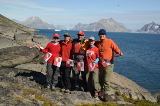 Greenland group with red banner